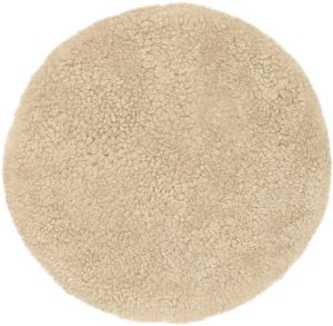 Round sheepskin rug in an Oyster colour, featuring a soft, curly texture and natural wool finish.